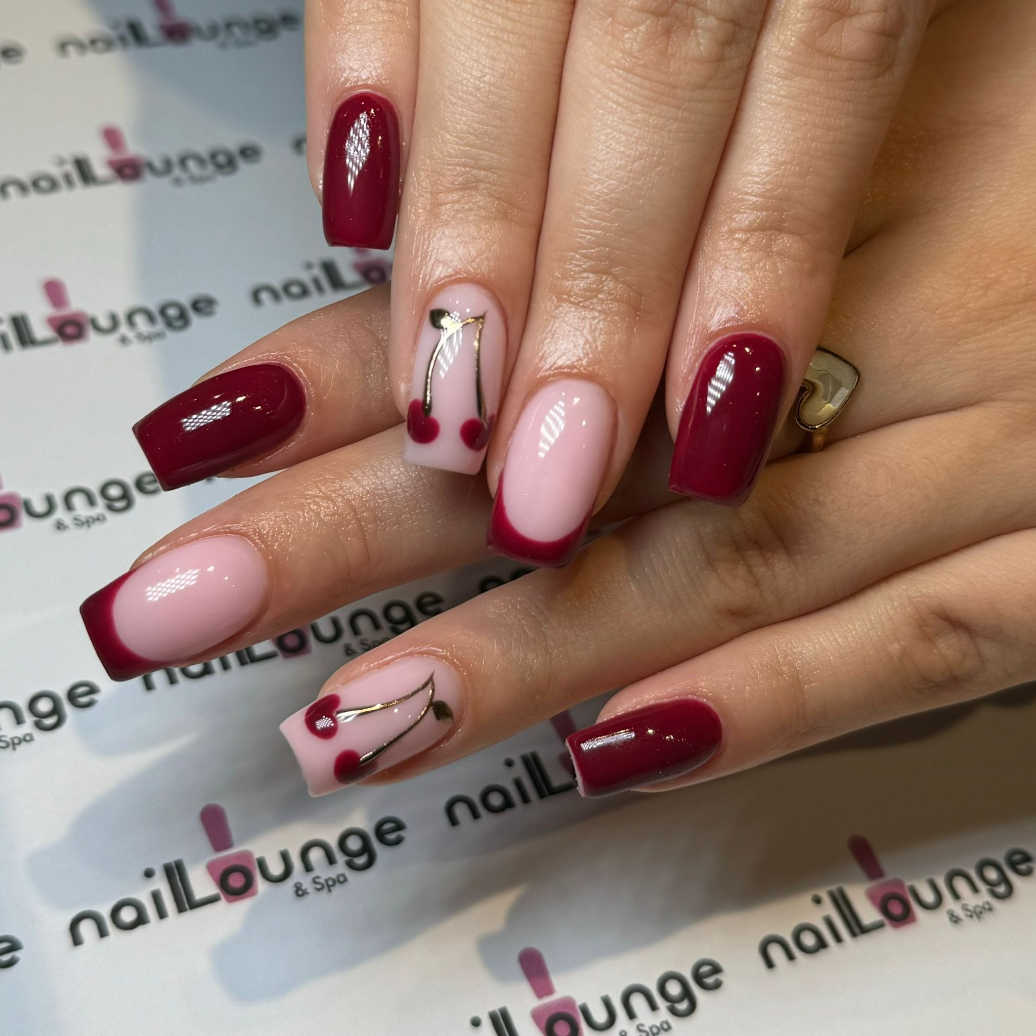 BIAB infill with cherry nail art at Nail Lounge & Spa Brighton